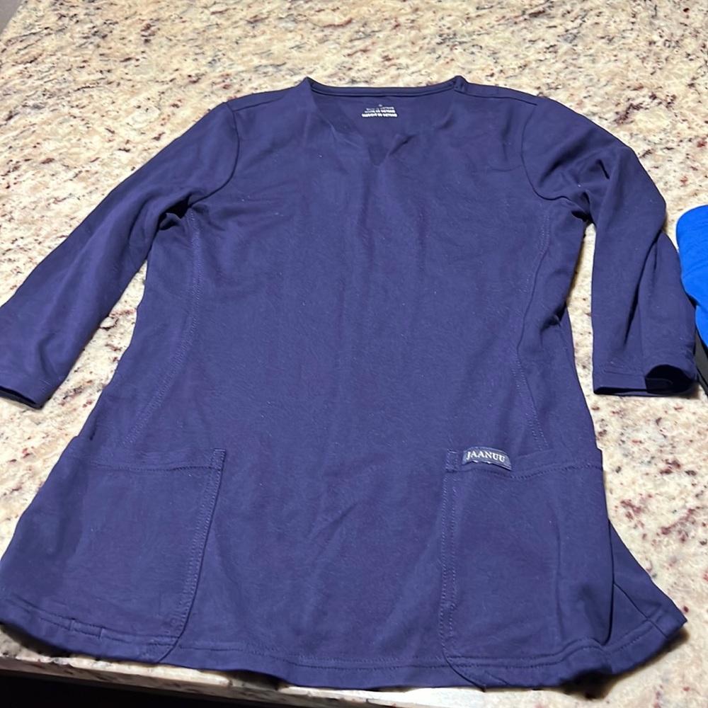 Jaanuu scrub top size small new without tag.